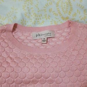 Millennial pink pullover knitwear